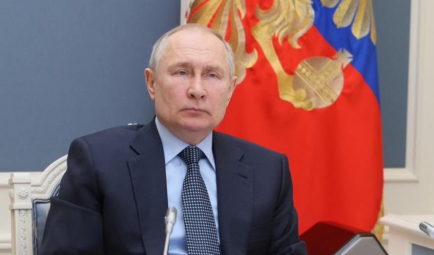 Operatives linked to Vladimir Putin are purchasing homes and warehouses near NATO facilities as part of a hybrid warfare strategy.