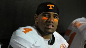 A woman claims LaTroy Lewis sent threatening and explicit messages demanding sexual acts, prompting the Atlanta Falcons to remove him from their website and staff directory within hours of the allegations.